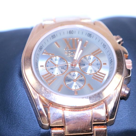 This is a new gold-toned stainless steel watch. - Picture 2 of 5